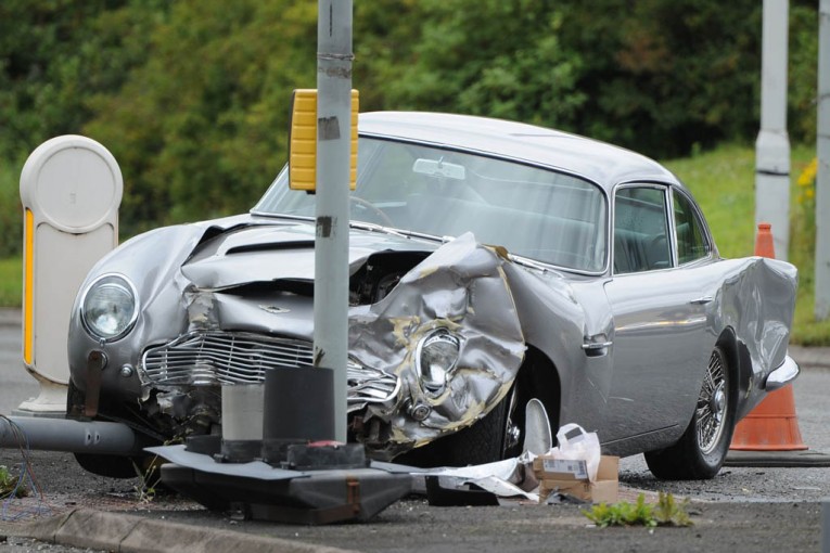 Four-year-old hurt as classic James Bond style Aston Martin DB5 is trashed in M56 smash near airport
